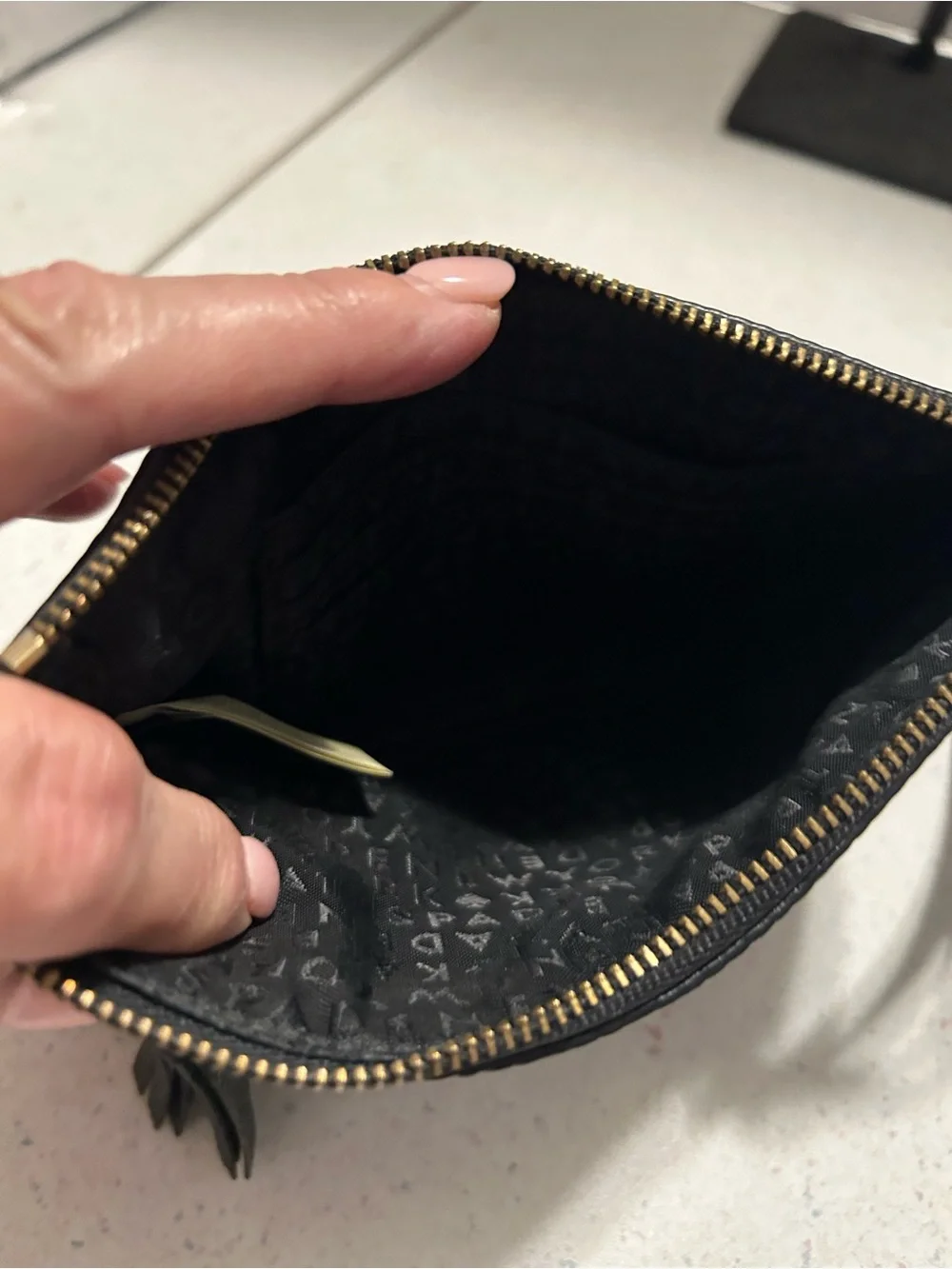 kate spade Black Pebble Leather Wristlet with Tassel